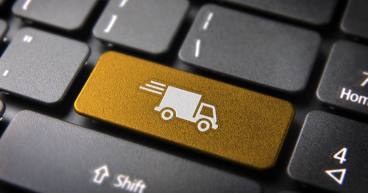 Tietokoneen näppäin jossa on kuorma-auton kuva. (Kuva:Shutterstock)